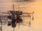 Fishing Boats and Fishermen, silhouetted against a Yellow/Orange Sea, Flores, Indonesia, Asia