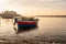 Fishing boats floating on the Mediterranean sea shore. Italy