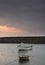 Fishing boats in harbour at sunrise