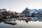 Fishing boats laying in the harbour of Hamnoy in Lofoten during blue hour.