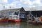 Fishing boats line the harbour during the Whitstable Oyster Festival