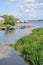 Fishing boats and motor ships in Volga river in summer, Russia.