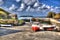 Fishing boats Mullion Cove harbour Cornwall UK in colourful bright HDR