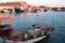 Fishing boats in Nea Michaniona port, Thessaloniki, Greece. Sunset seascape.