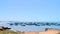 Fishing Boats Parked in Harbor with Blue Sea and Open Sky - Fisheries and Marine Industry - Countryside in Chorwad, Gujarat, India