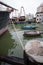 Fishing boats are at the pier at the fishing port in Macau.