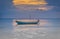 Fishing boats in the sea and beautiful sky while the sunset.