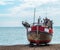 Fishing boats on the shore, pebble beach, wooden boats, fishing