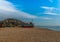 Fishing boats on the shore, stony beach, fishing industry,