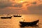 Fishing boats, small boats floating in the sea at sunrise, Concept sea in the morning.
