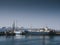 Fishing boats and snowy mountains in Husavik