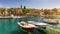 Fishing boats in Splitska village with beautiful port, Brac island, Croatia. Village of Splitska on Brac island seafront view,