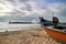 Fishing boats stranded on Aguda beach and Giant waves breaking on the breakwater