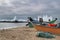 Fishing boats stranded on Aguda beach and Giant waves breaking on the breakwater