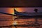 fishing boats and sunset shadows on the beach