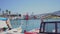 Fishing boats and vessels with turkish flag stands in row in Kusadasi city dock.