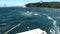 Fishing box cage in ocean background of waves in New Zealand.