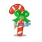 Fishing candy cane character shaped a cartoon