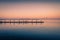 Fishing docks at sunset and birds flying around. Dreamy image.