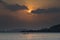 Fishing at dusk under an incredible orange sunrise