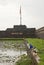 Fishing in front of the Citadel in Hue