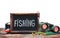 Fishing gear and blackboard