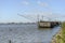 Fishing hut on the briny lagoon, Comacchio, Italy