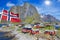 Fishing hut rorbu in the Hamnoy and Lilandstinden mountain In Background, Reine, Lofoten islands, Norway