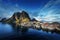 Fishing hut at spring sunset - Reine, Lofoten islands, Norway