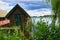 Fishing lodge on the lake near Krakow on the lake. Inland fishing. Vine roof on the house