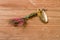 Fishing lure with bright colors on a wooden background