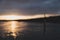 Fishing lure on line above the Naknek River in Alaska during sunrise