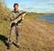 Fishing man with big zander fish