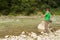 Fishing on mountain river in summer