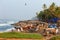 Fishing net with many fishermen on backside. Odayam beach, Varkala, India