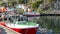 Fishing nets, colorful buoys on the quay of the Norwegian marina