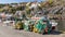 Fishing nets, colorful buoys on the quay of the Norwegian marina