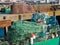 Fishing nets drying on the dock, with lobster pots on a fishing boat below