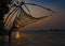 Fishing nets idle at sunset