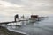 Fishing Pier and Smooth Ocean at Sunrise, Old Wood Pier