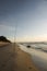 Fishing pole in sand on beach