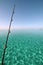 Fishing rod over blue lagoon