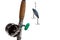 A fishing rod, reel and lure on a white background