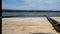 Fishing Rods on the Background of the River on a Hot Summer Day. A Calm Environment Near the River.