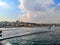 Fishing rods on the Galata bridge close-up against the background of the panorama of the embankment of Istanbul Turkey.