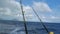 Fishing rods on sailing motor boat
