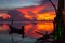 Fishing sailboat silhouette at sunset view