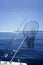 Fishing scoop net on boat in blue sea