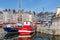 Fishing ship in old medieval harbor Honfleur, France