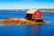 Fishing stage on rocky island